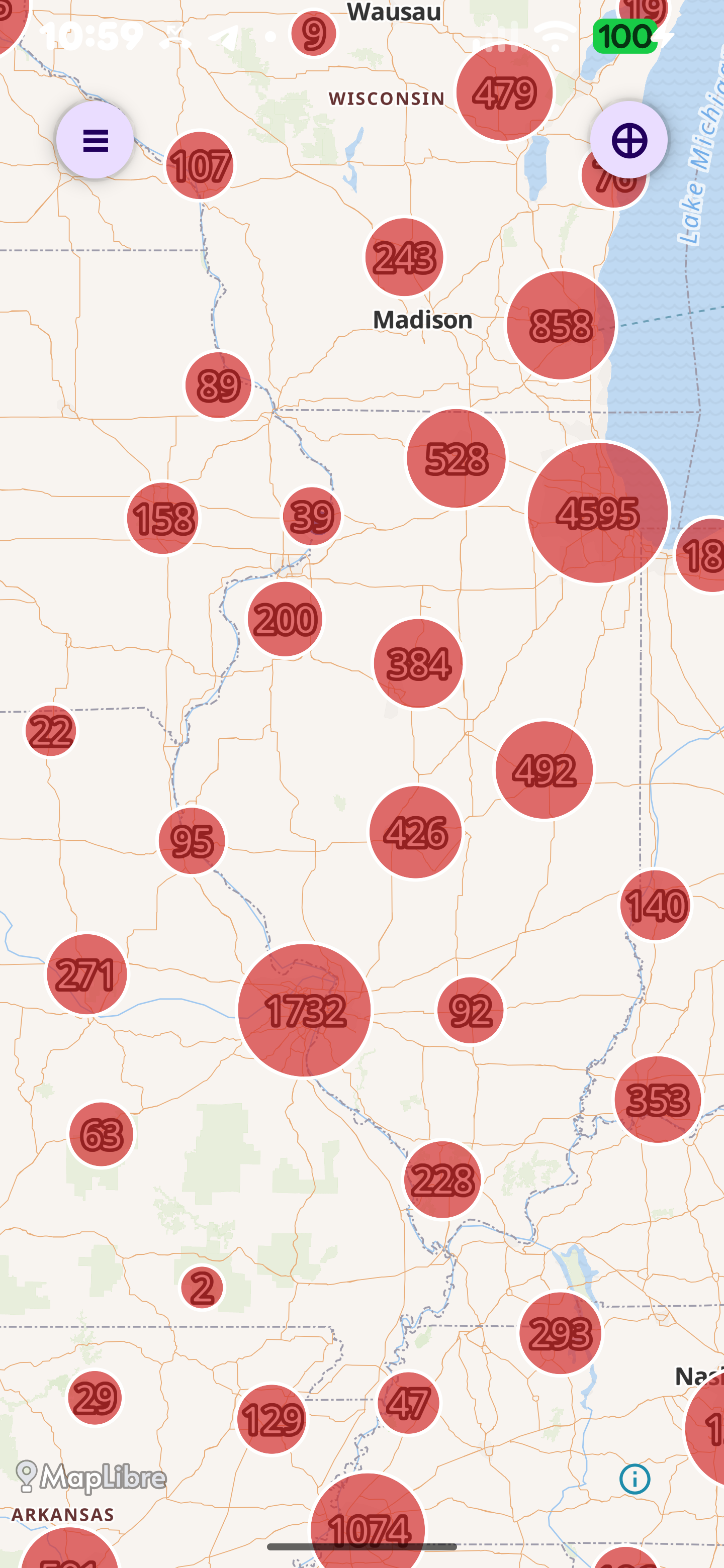 The RedactedRoute map zoomed out over the middle of the United States, showing red cluster bubbles with camera counts per region — thousands of ALPR cameras across Wisconsin, Illinois, Iowa, and beyond.